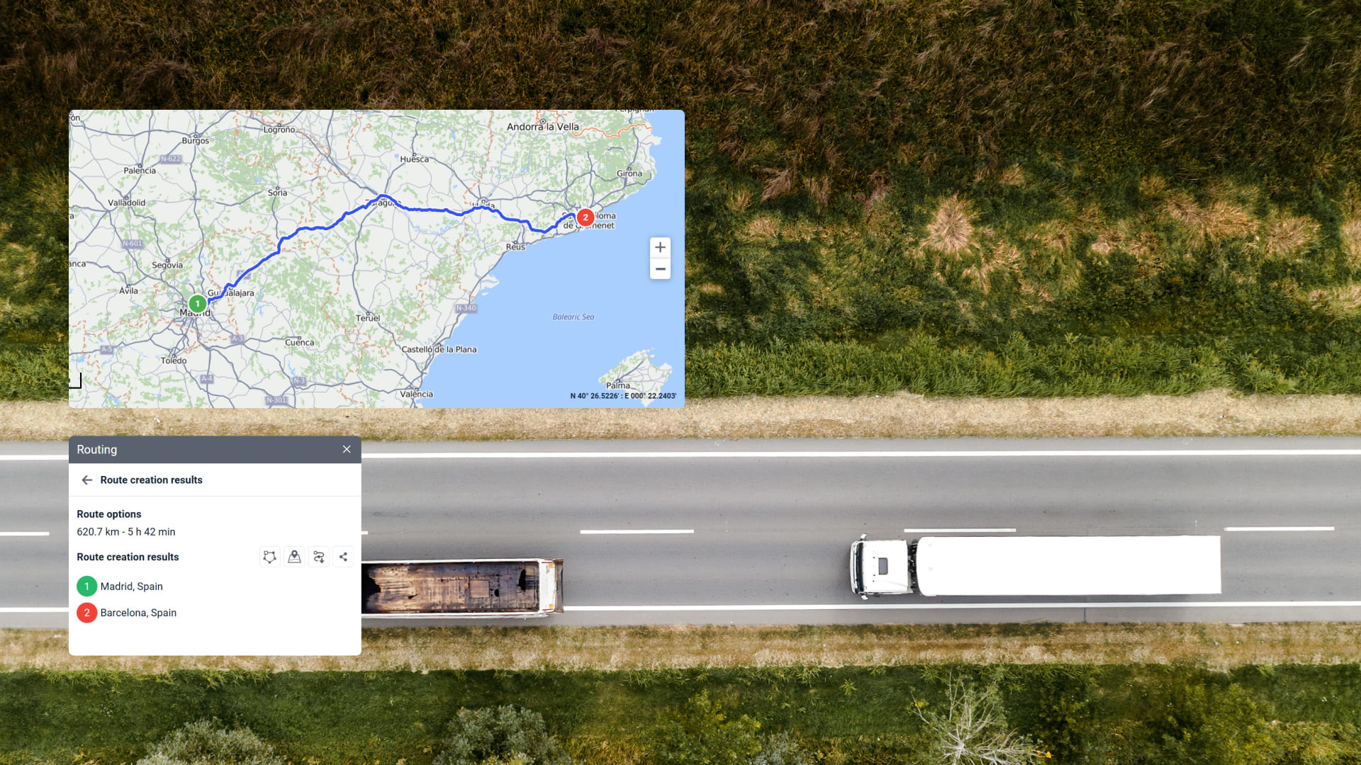 Top-down 18-wheeler driving from right to left on an empty road